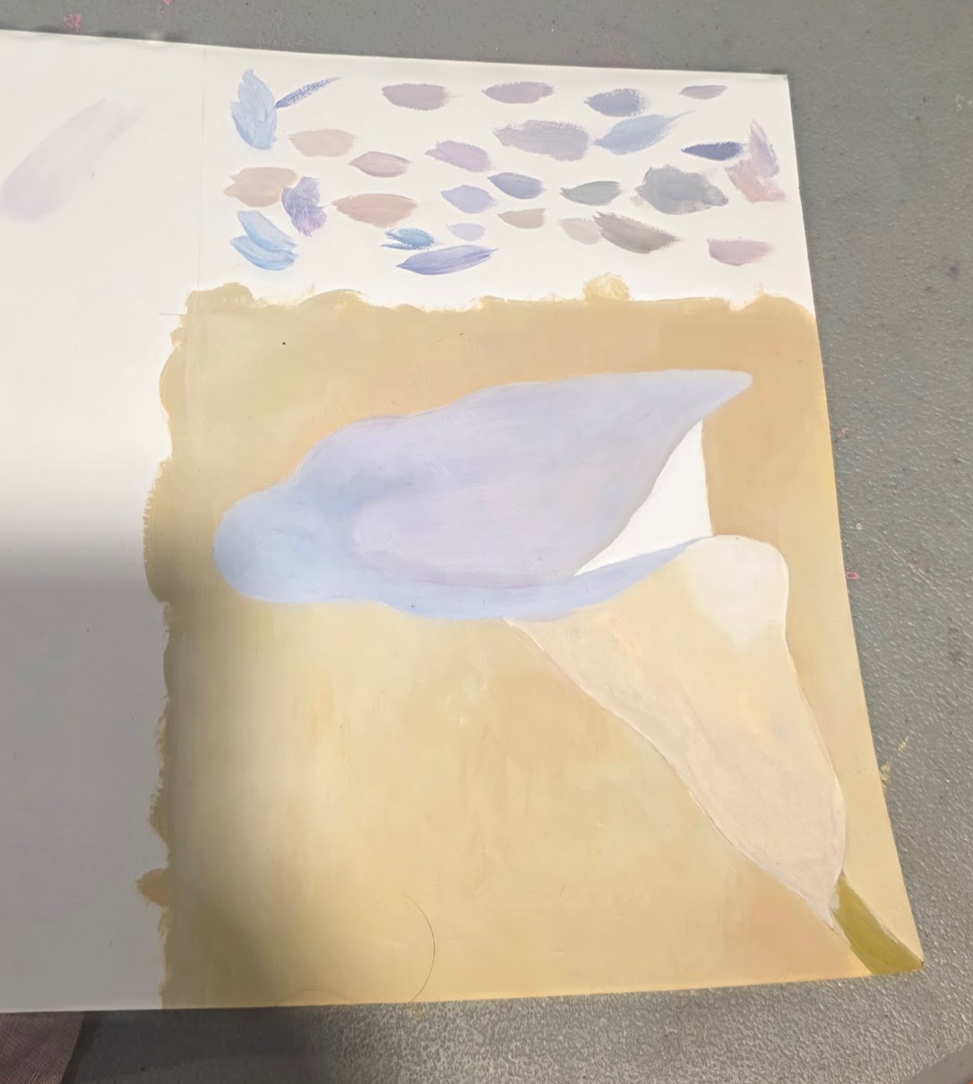 Calla lily painting in progress by ArtY, with petal colour tests in soft blues and purples at the top of the sketchbook page